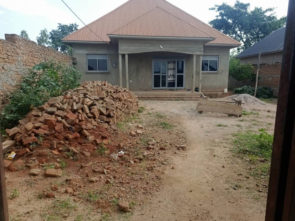 The house as it looked when they first moved in, still under construction