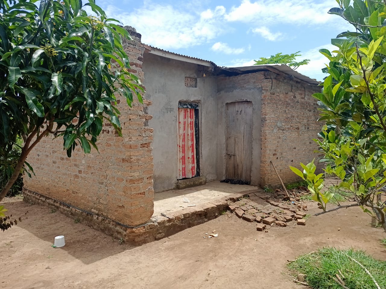 The rented storage section where the children lived for six months before moving into the house